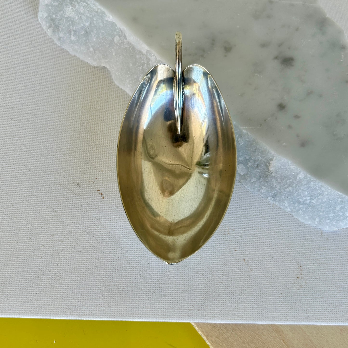 Small polished steel leaf dish