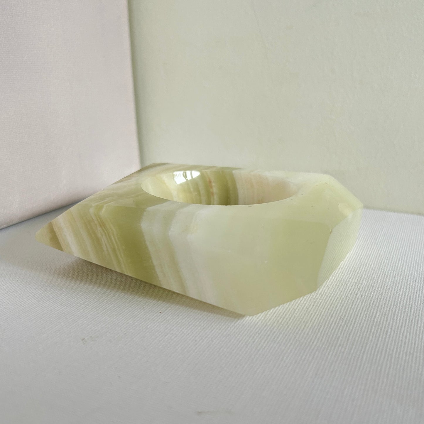 Pale green marble vessel