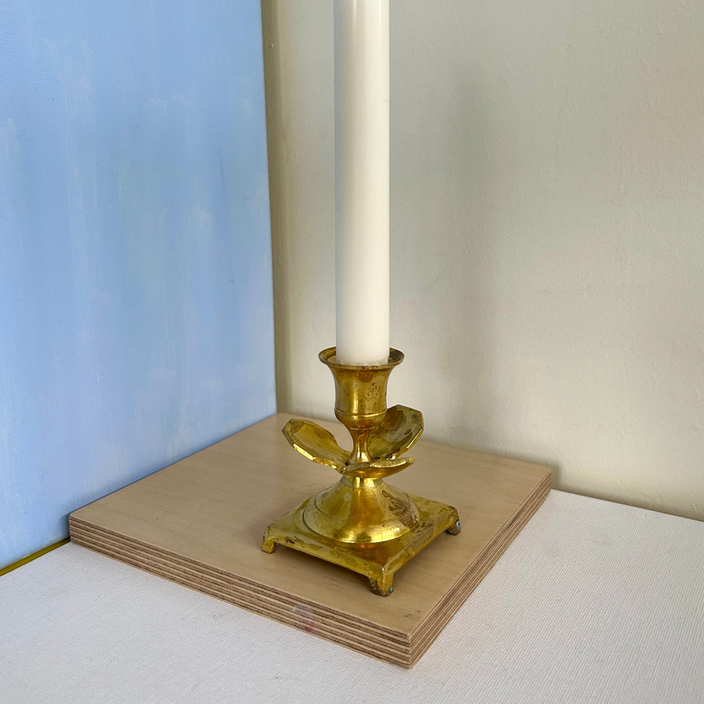 Hand-worked brass candle holder