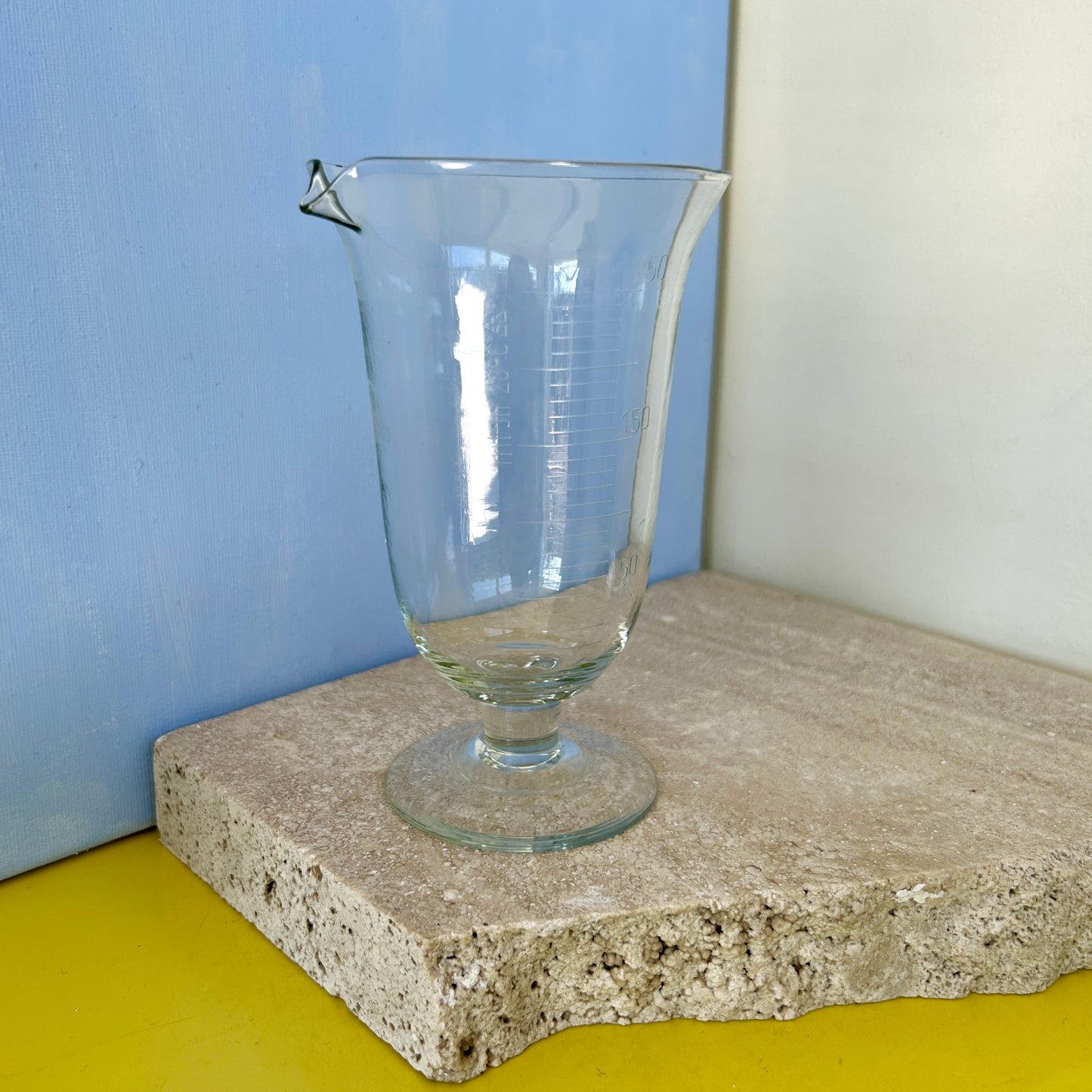 Clear glass measuring cup or vase