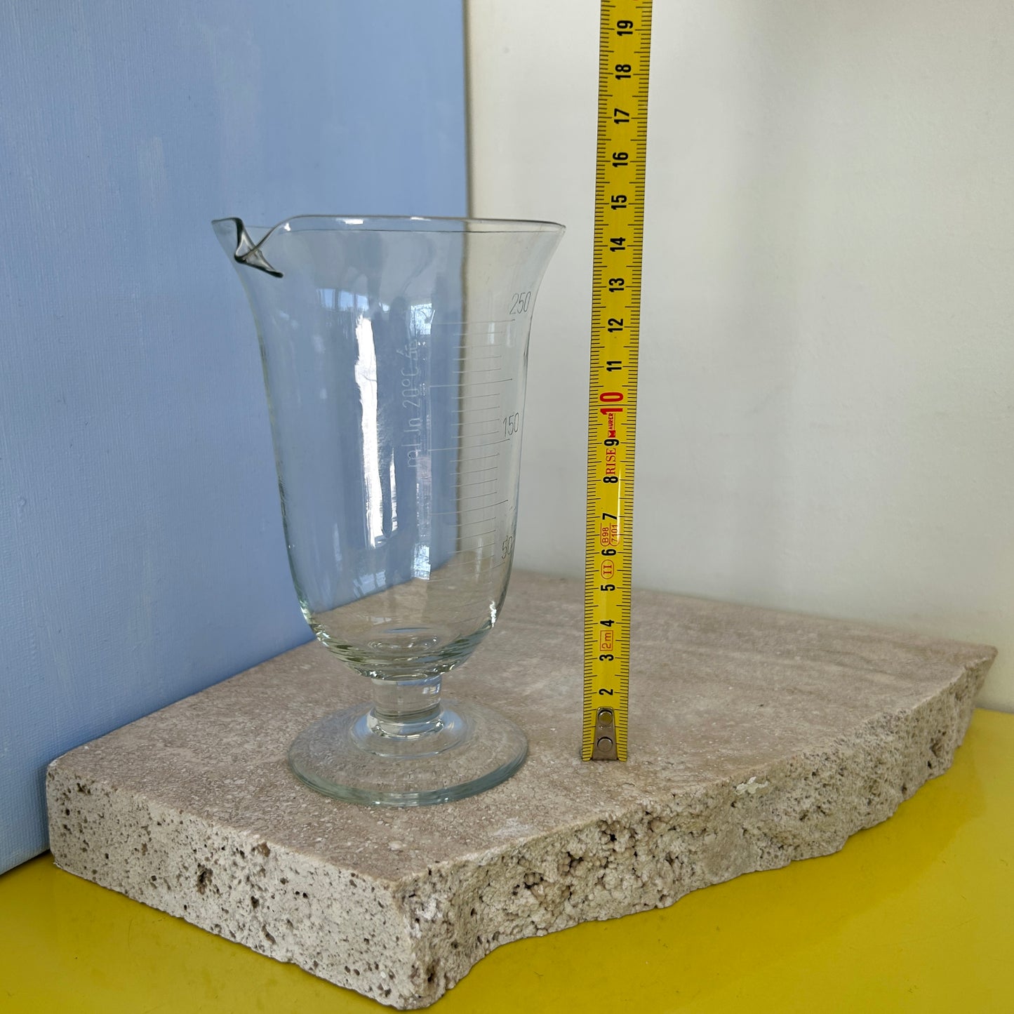 Clear glass measuring cup or vase